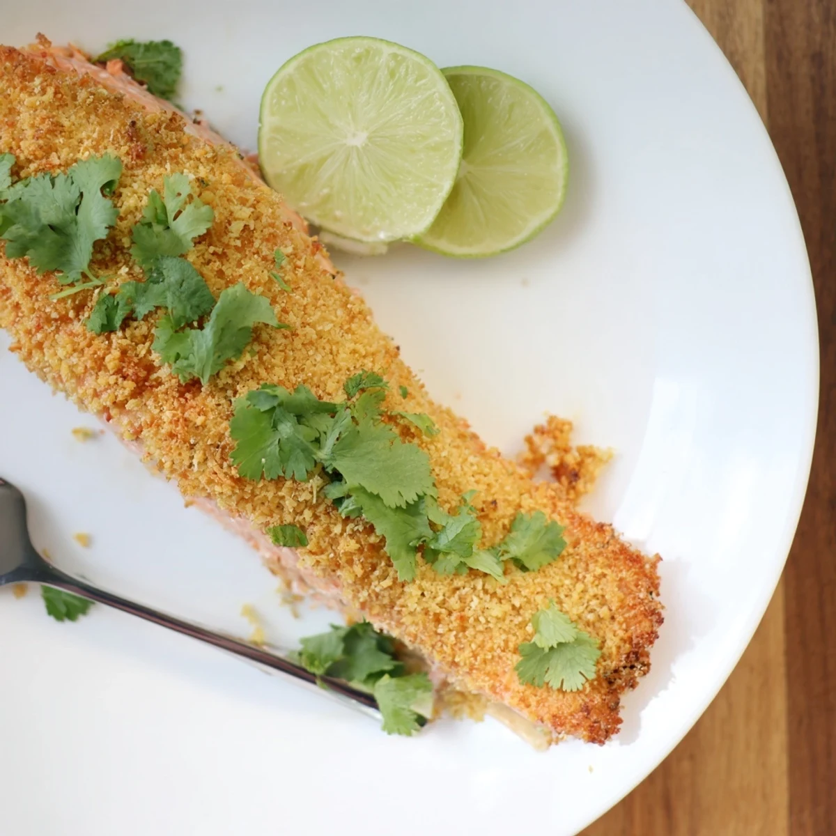 Tender salmon coated in a crunchy coconut crust, perfect for a delicious dinner.