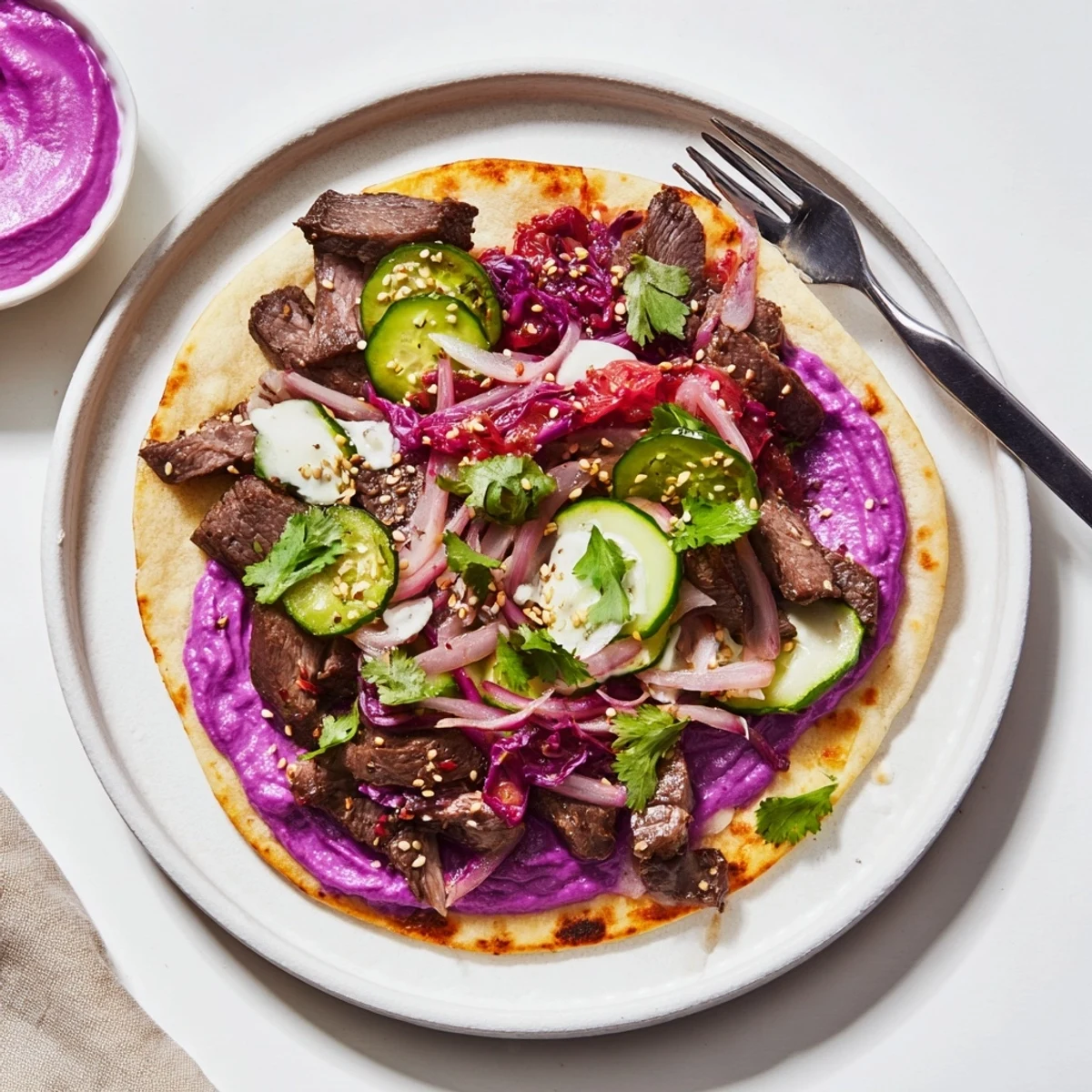 Deliciously layered bowls featuring marinated protein and colorful Asian-Mexican toppings.  