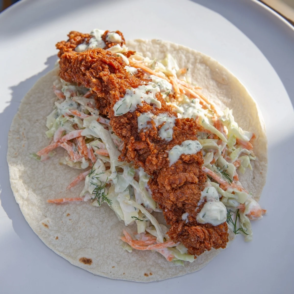 Get a taste of these delicious Buffalo Chicken Smash Burger Tacos, bursting with saucy, spicy chicken.