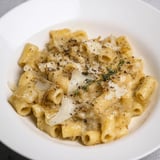 Golden-brown Gruyère tops this comforting creamy French onion ditalini, a beautiful aroma of savory flavors.