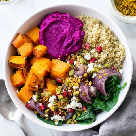 Roasted winter vegetables create a vibrant spiced winter bowls of flavor and warmth.  