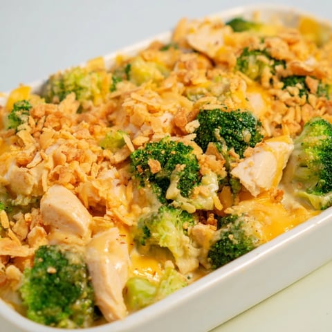 Golden-brown Chicken & Broccoli Cheddar Bake bubbling hot from the oven with a cheesy topping.