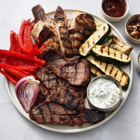 A Backyard BBQ Companion: a platter overflowing with grilled meats, vegetables, and savory dips.