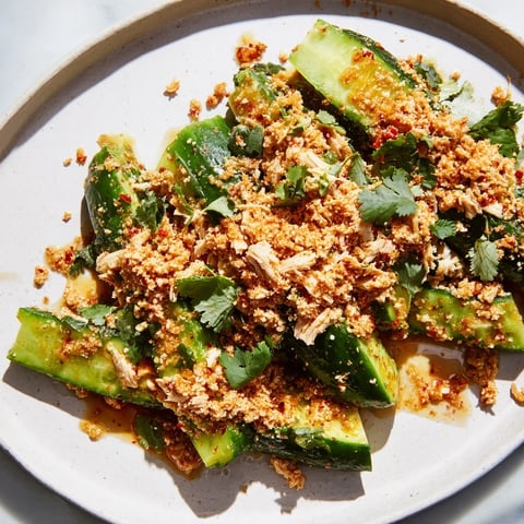 Whole Logan Cucumber Salad with rotisserie chicken: fresh cucumbers tossed in sesame oil.