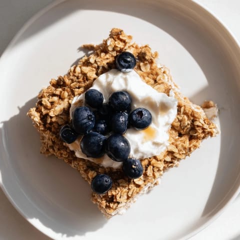 A close-up shot of a warm, comforting slice of Protein Pancake Oats, perfect for a high-protein breakfast.