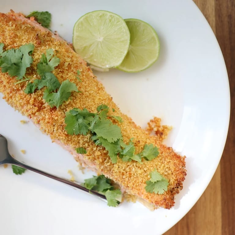 Tender salmon coated in a crunchy coconut crust, perfect for a delicious dinner.  